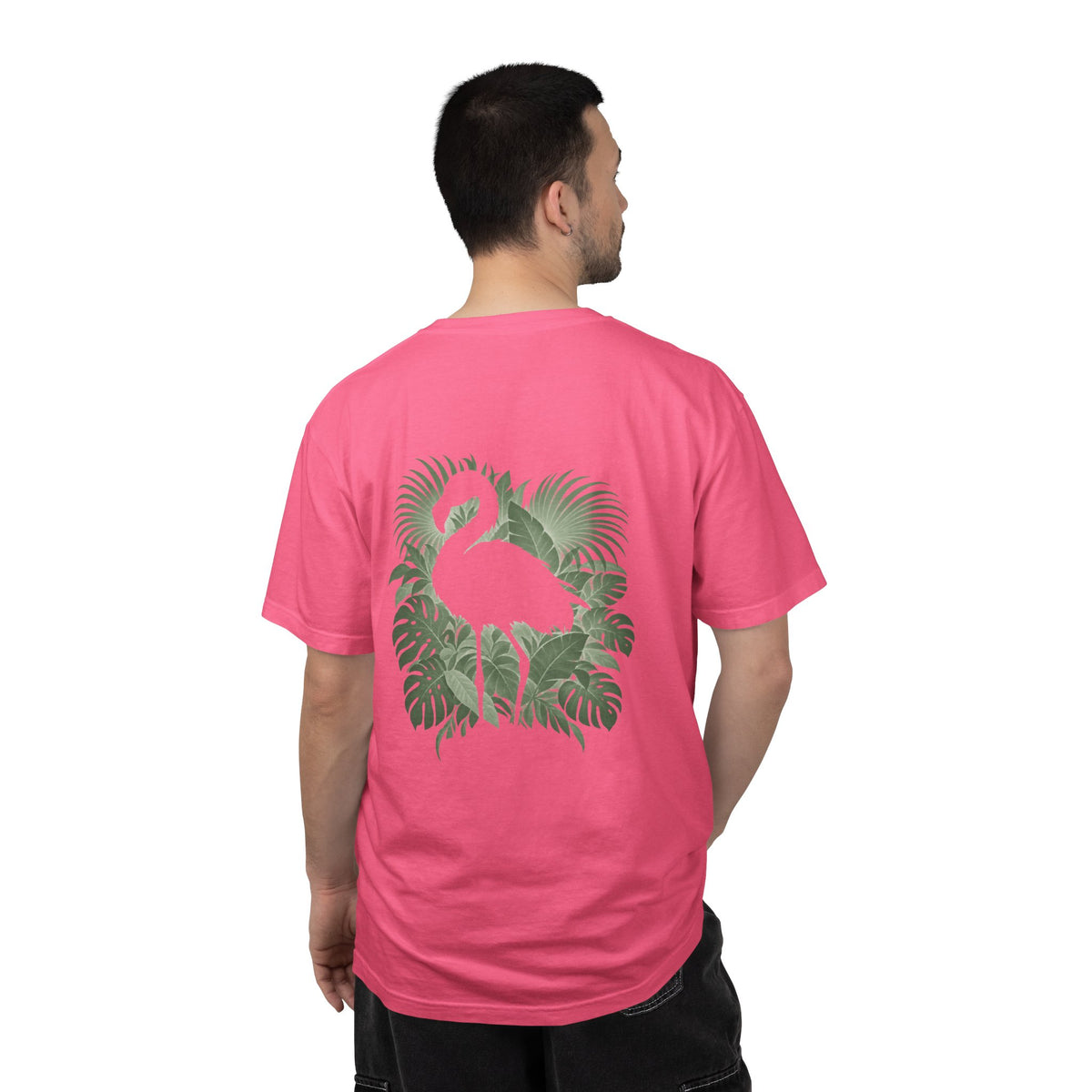 Model wearing the Crunchberry Hidden Flamingo T-shirt, showing a flamingo silhouette framed by tropical leaves on the back.