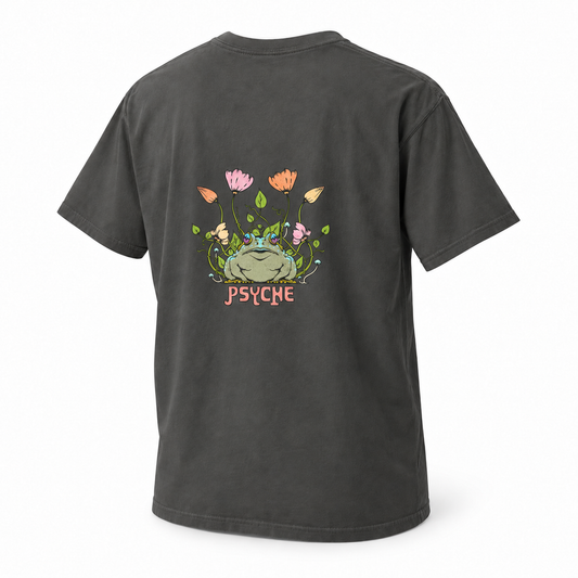 Pepper Psyche Toad t-shirt, angled back view on a white background with the original toad, flowers, mushrooms and pink PSYCHE lettering.