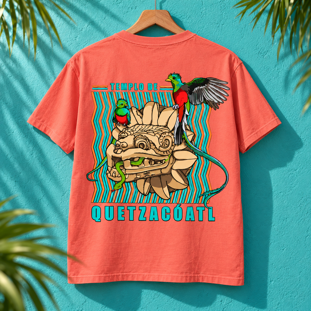Bright Salmon Quetzalcoatl graphic t-shirt, back view against a turquoise wall.